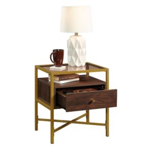 Is your living room looking a bit boring and bland? Add a little style and glam to your home décor with this wood and metal side table from the Harper Heights® collection. This glass top side table offers a spacious top surface with all room for items like a lamp