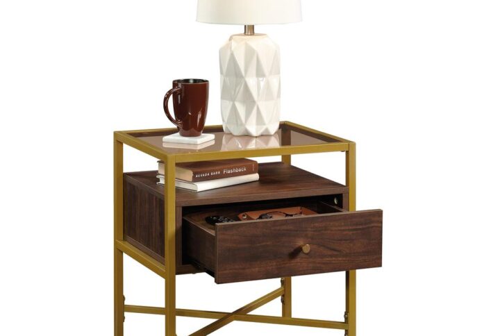 Is your living room looking a bit boring and bland? Add a little style and glam to your home décor with this wood and metal side table from the Harper Heights® collection. This glass top side table offers a spacious top surface with all room for items like a lamp