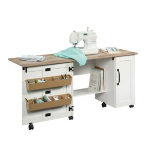 Let your crafting heart go wild! Create the perfect space in your home for all your sewing and crafting needs with this sewing and craft table from the Sauder Select collection. This rolling sewing table offers a spacious top surface that provides you with the room you need for all your supplies like your sewing machine