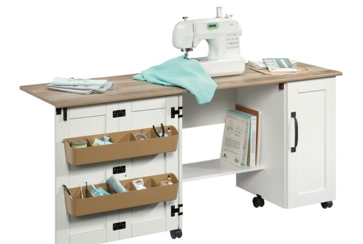 Let your crafting heart go wild! Create the perfect space in your home for all your sewing and crafting needs with this sewing and craft table from the Sauder Select collection. This rolling sewing table offers a spacious top surface that provides you with the room you need for all your supplies like your sewing machine