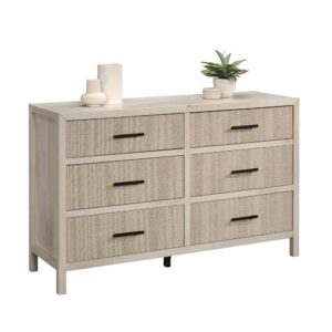 Looking for a bedroom dresser that is as stylish as the clothes inside of it? This 6-drawer dresser from the Pacific View® collection has the style you want with the functionality that you need. This wood dresser features six large drawers that open and close on smooth metal runners for easy-access storage of items like denim jeans