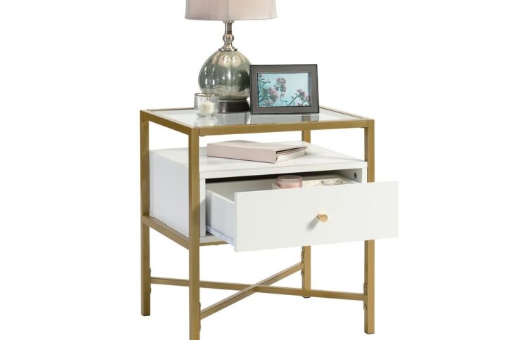 Updating the look of your home can be as easy as adding a stylish new wood and metal side table. Give your living room the style it deserves with charming style and modern design of this side table with storage from the Harper Heights® collection. This glass top side table offers a spacious top surface with room for items like a lamp