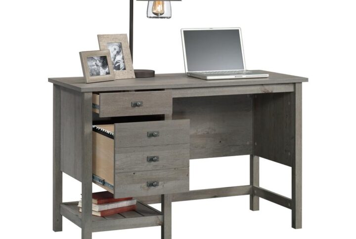 A simple desk that packs a big punch: This desk from the Cottage Road® collection ships you off to a land far away with its stylish design and multi-functionality. This coastal desk features two drawers with full extension slides