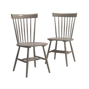 Add a touch of rustic farmhouse beauty to your dining room or seating area with this pair of spindle back chairs from the New Grange collection. This wooden spindle chairs (in a set of two) features a solid wood construction for added durability while you sit down to tie your shoes