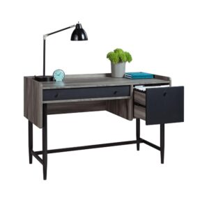 "Work" never felt so easy. Enhance your home office space with this desk from the Harvey Park® collection. This modern home office desk features a spacious work surface that offers room for all your desk essentials – laptop