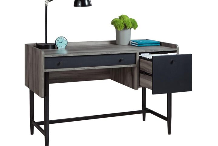 "Work" never felt so easy. Enhance your home office space with this desk from the Harvey Park® collection. This modern home office desk features a spacious work surface that offers room for all your desk essentials – laptop