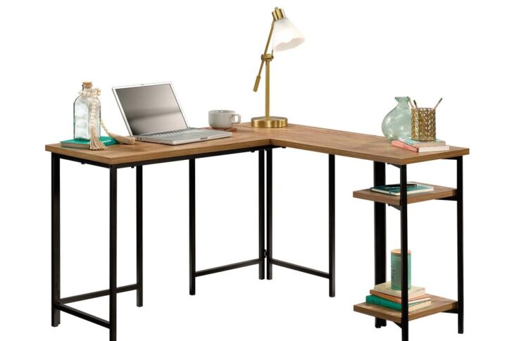 Looking to update your home office space? We can help! Create the home office of your dreams when you add the industrial-inspired style and functional design of this modern L-shaped desk from the North Avenue® collection. This metal and wood desk offers a spacious top surface that provides you with all the room you need for different items like your laptop