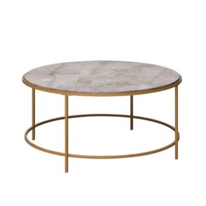 Bring your coffee table into the 21st century with the International Lux® metal and wood coffee table. This stylish but functional round coffee table brings luxury into any home without being visually overwhelming. The large faux stone top allows you to display home décor