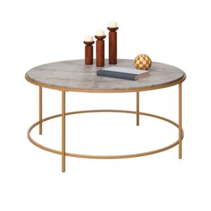 house remotes and offers a place to play board games with your loved ones. This round modern coffee table is perfect for versatile placement in any room as it is finished on all sides in a Satin Gold metal frame and the top surface is finished in a cool Deco Stone. No matter how you rearrange your home