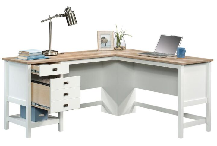 You spend a lot of time at your home office desk. Why not make the experience stylish and new but familiar and cozy? Make your home workspace somewhere you want to be with this L-shaped desk from the Cottage Road® collection. This home office desk features a spacious top surface for your computer