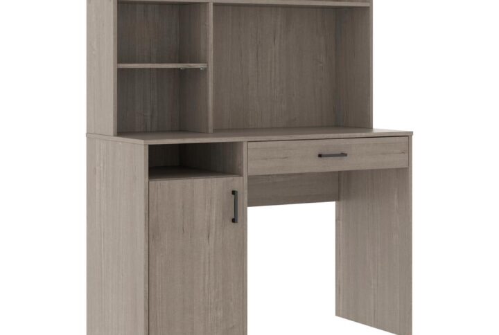 Looking to update your home office? We've got you covered! Give your home office the stylish upgrade it needs with this computer desk with hutch from the Beginnings® collection. This modern small office desk offers a spacious top surface that provides you with the room you need for desk essentials like your laptop