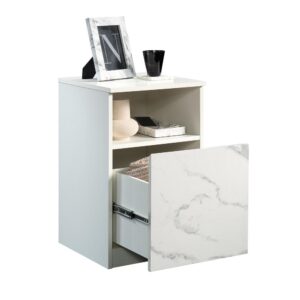 Enhance the look of your bedroom with the timeless charm and simplistic beauty of this nightstand from the Hudson Court® collection. The spacious top surface of this bedside table with drawer provides you with the ideal amount of space for all of your must-have bedside necessities – an accent lamp