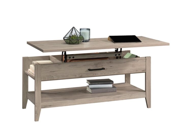 Enhance the functionality of your living room or den with this lift-top coffee table from the Summit Station® collection. The top of this coffee table lifts up and forward to create an elevated and versatile work surface for sharing a snack