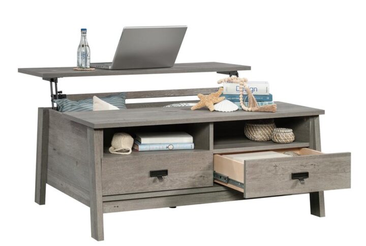 Add some unique style and functionality to your home with this lift-top coffee table from the Trestle® collection. This coffee table with drawers offers a spacious top surface that lifts up and forward to create a multipurpose workspace for you to work from home