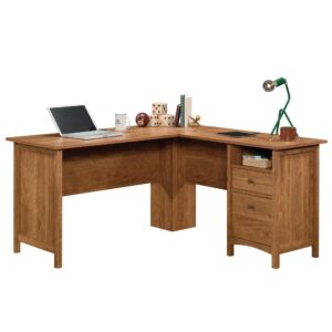 A classic L-shaped desk with some modern flair—the Union Plain® collection delivers that and more. This shaker style desk includes a file drawer with full extension slides that holds letter-size hanging files. A small drawer with metal runners and safety stops makes this L-shaped home office desk ideal for storing your sticky notes