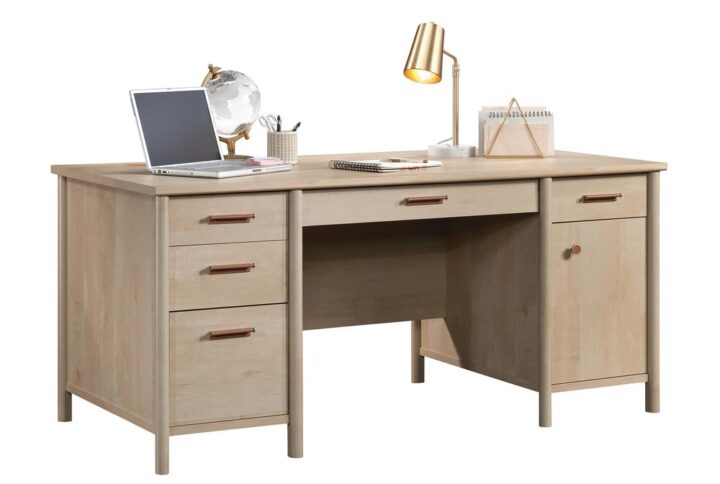 Your home office should reflect your style. What is better than an executive desk that allows your décor to shine? This executive desk with storage from the Whitaker Point® collection features a strong lightweight 1” panel construction that provides you with ample room for all your must-have desk supplies: your laptop or computer monitor