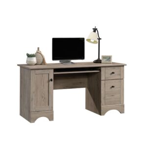 Simple but effective- the computer desk from the Sauder Select collection means business. A slide-out keyboard/mouse shelf with metal runners and safety stops keeps your home office desk ergonomics tip top while keeping your top surface space organized. The top surface is large enough for a computer