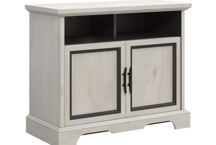 Your favorite show is on! Call up your friends and gather around this TV stand with doors from the Carolina Grove® collection. This 2-door TV stand accommodates up to a 39" TV weighing 35 lbs. or less