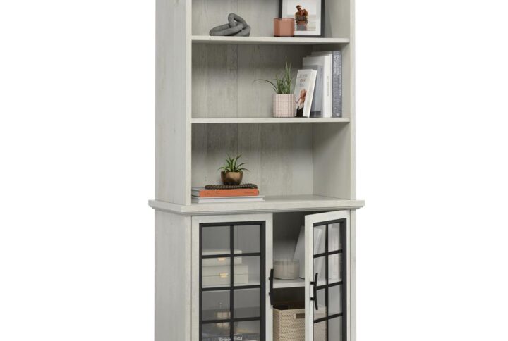 Add stylish storage where you need it with the classic look and versatile design of this bookcase with doors from the Carolina Grove™ collection. This display bookcase features a strong and lightweight 1" panel top construction. Three open shelves conveniently store items like work binders