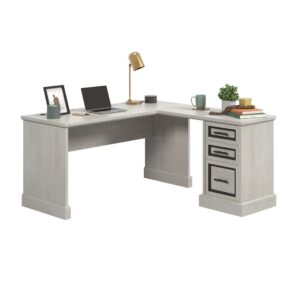 beautifully detailed with contrasting black hardware and accents around the drawer fronts. This L-shaped computer desk allows you to store