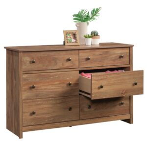 Have enough storage until the cows come home. This dresser from the River Ranch® collection offers 6-drawer storage for any style of home décor. This bedroom dresser features six drawers on metal runners and safety stops. The lower four drawers of this 6-drawer dresser are extra deep