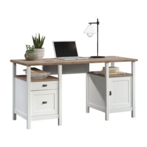 Needing a classy desk that doesn't take up all the space in your home office? The two-toned and stylish double pedestal desk from the Cottage Road collection is the perfect solution for your office needs. This home office desk features a smaller drawer for items like pens