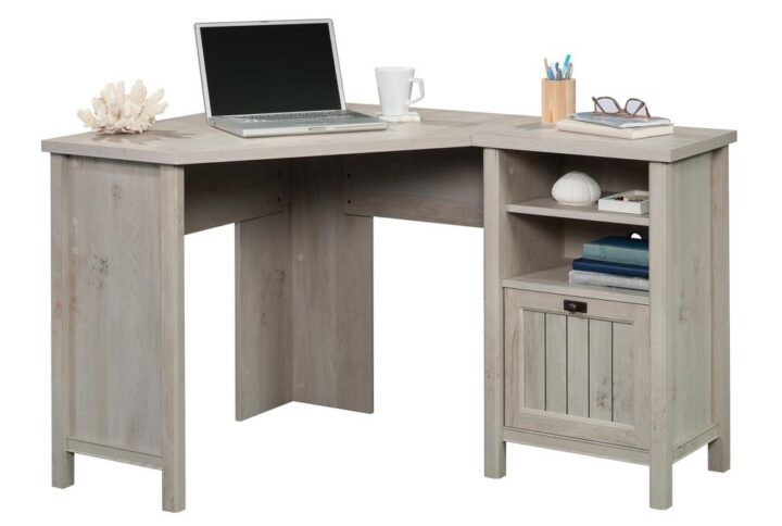 Maximize the space in your home or office with this corner computer desk from the Costa collection. This corner home office desk can be assembled with the pedestal on the left or the right