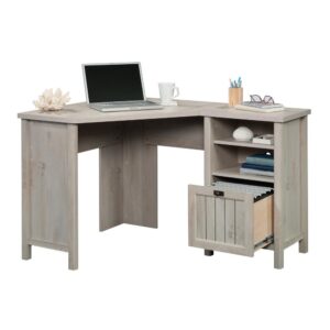 allowing you to customize it to fit your needs in any corner setting. This corner home office desk features a file drawer with full extension slides that holds letter-size hanging files. An open storage area features an adjustable shelf