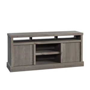 divided cubbies are the perfect place on this TV credenza to hold audio/video equipment