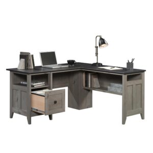 The L-shaped desk from the August Hill collection brings a modern farmhouse aesthetic to your home office. This L-shaped home office desk features a file drawer with full extension slides that holds your most important letter-size hanging files. Cord clutter is a thing of the past because this farmhouse L-shaped desk features desktop grommet holes and pass-throughs for cord management. An open shelf above the file drawer features convenient storage for books