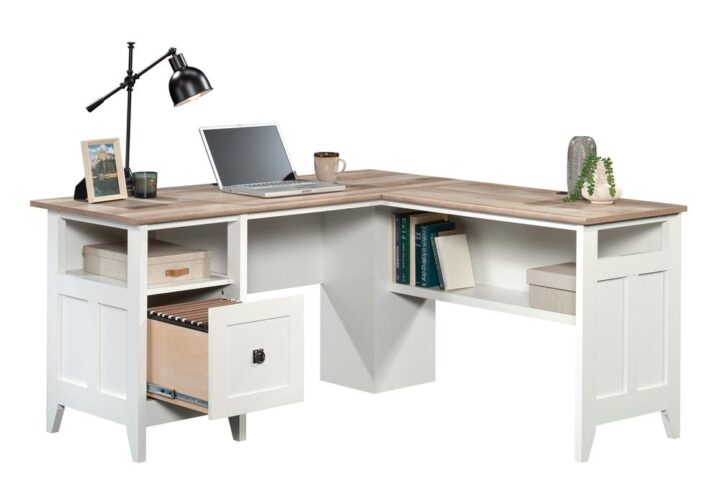 Bring the modern farmhouse look into your home with this L-shaped desk from the August Hill collection. This L-shaped home office desk features one file drawer with full extension slides that holds letter-size hanging files