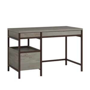 Simple but extremely functional. And stylish too. This single pedestal desk from the Manhattan Gate collection features three drawers. Two smaller storage drawers with metal runners and safety stops conveniently store your favorite pencils