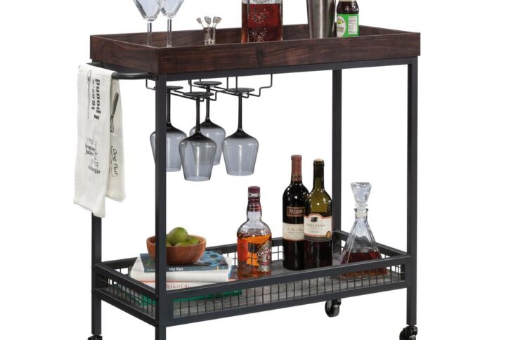 A utility cart with style and function? What could be better! This bar cart from the Market Commons® collection combines industrial elegance with multifunctionality for the perfect addition to your home. This rolling bar cart features two shelves for storage and display of bar cart essentials—glasses