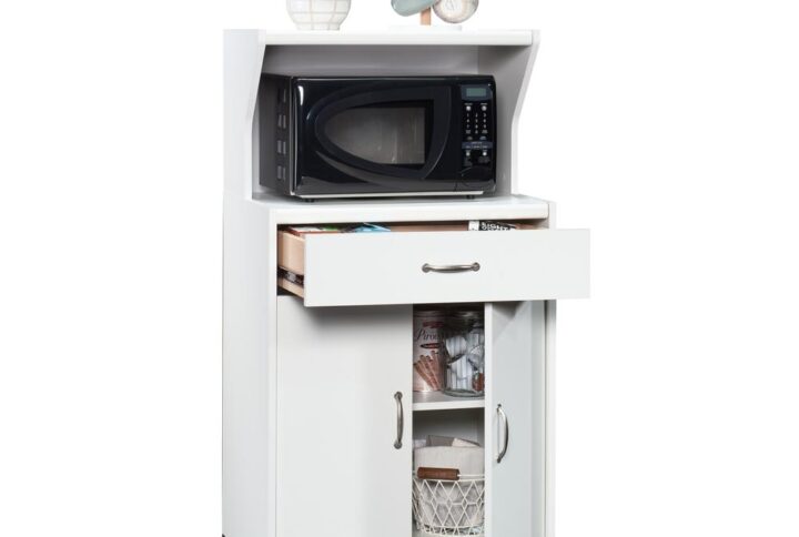 Add to your kitchen counter space without breaking the bank with this microwave kitchen cart from the Sauder Select collection. This kitchen cart with microwave shelf features a dedicated area for your microwave oven to avoid taking up valuable space on your kitchen counters. This kitchen cart microwave stand also has a spacious top shelf for additional display and storage of plates