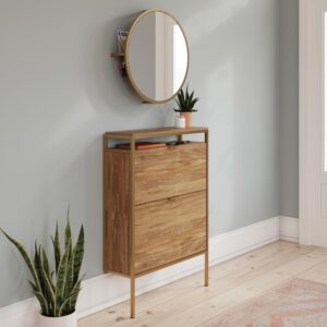 the cabinet features two tilt-out doors that conceal storage compartments. Display decorative plants