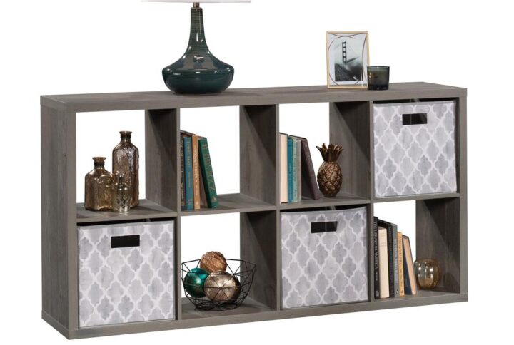 Kick clutter and chaos to the curb. Become the master of organization with the versatile storage options of this 8-cube organizer from the Sauder Select collection. This tall storage bookcase features eight spacious cubbyholes for convenient storage of items like your collection of books