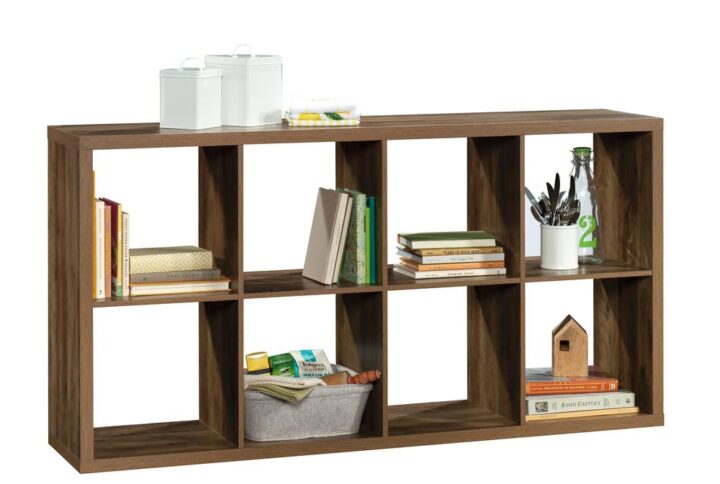 No home is complete without a place to store and show off your cool stuff. Organize all your miscellaneous items without having to sacrifice on style with this 8-cube organizer from the Sauder Select collection. This tall storage bookcase features eight spacious cubbyhole areas that provide you with the ideal amount of space to store a variety of different items like your collection of best-selling novels