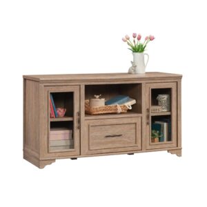 This office credenza from the Rollingwood™ collection is an essential furniture piece for any modern home office space. This credenza with file drawer features a durable