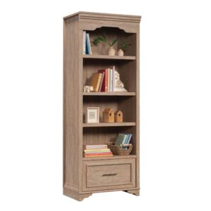 Add a touch of timeless beauty and charming style to your home with this bookcase with drawer from the Rollingwood™ collection. This bookcase with storage features three adjustable