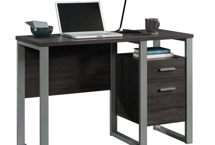 Whether you're looking for a place to get some work done or just need another surface for your home hobbies. This single pedestal desk from the Rock Glen® collection is perfect for you. This home office desk with storage features a small storage drawer with metal runners and safety stops that provides versatile storage for pens