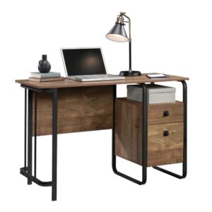 Create the perfect home office workspace with this single pedestal desk from the Station House® collection. This computer desk with drawers features a spacious tabletop that provides you with room for all your office essentials – a computer monitor or laptop