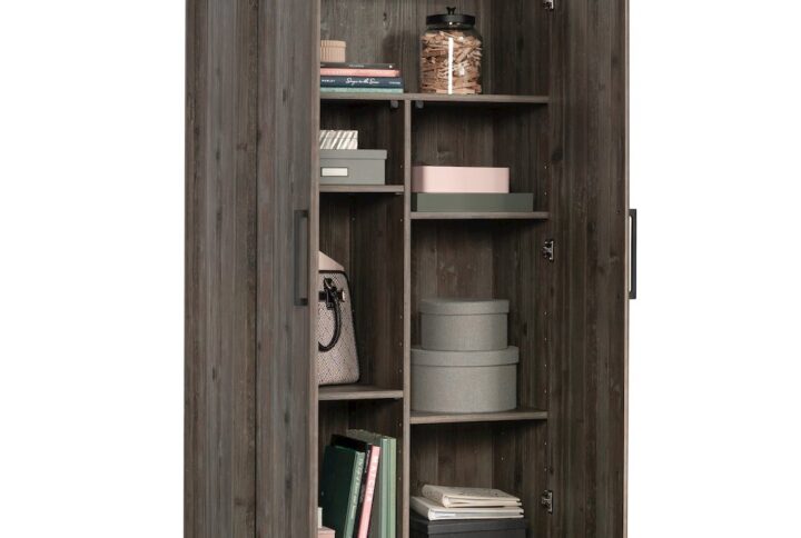 Rejoice in stylish storage solutions with this two door storage cabinet from the Summit Station® collection. This double door storage cabinet features a hidden storage area that provides a spacious area for you to stow away a variety of different items: jeans