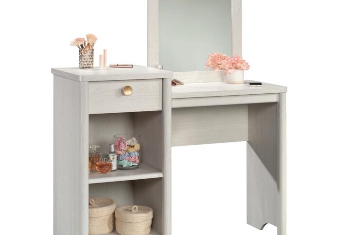 A makeup counter in your own home—who doesn't want that? Store all your beauty essentials in one place with this bedroom vanity from the Dover Edge® collection. This bedroom vanity with mirror offers spacious tiered surfaces with open storage shelving for items like eye shadow palettes