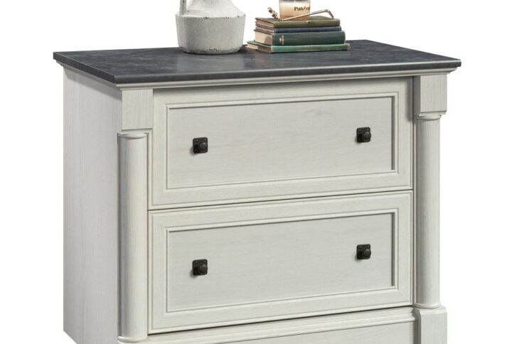 The ornate details and light finish of this lateral file from the Palladia® collection will have you storing your files in style. This lateral filing cabinet features two large drawers with full extension slides to hold letter