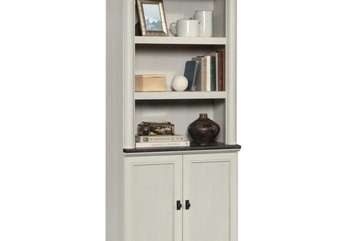 No home office is complete without convenient storage and organization. Tidy up your workspace without having to sacrifice on style with this library bookcase with doors from the Palladia® collection. This library bookcase with doors features spacious shelving that provide you with the space to store and display various items such as your collection of books