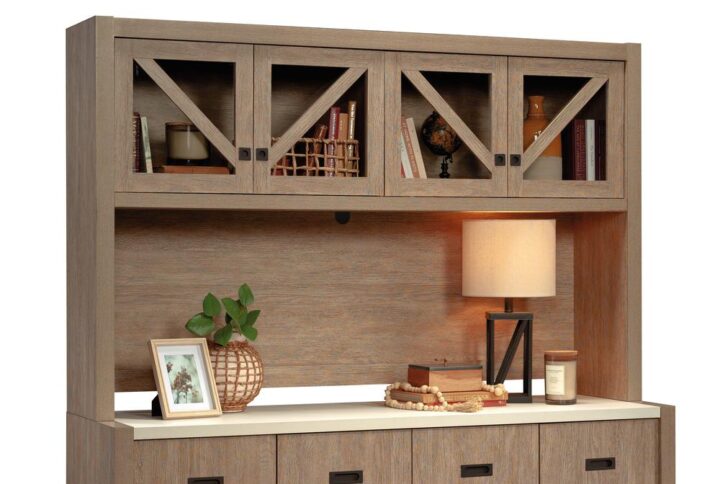 This office hutch with storage from the Dixon City collection will be the contemporary country focal point of your office. Finished in the rustic