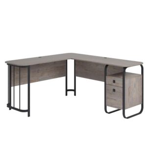 This L-shaped desk from the Station House® collection brings rustic