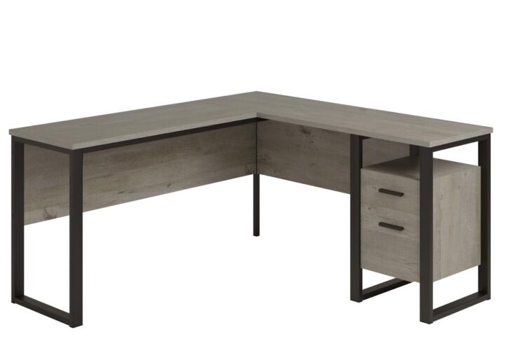 Add some soft industrial style to your home with the design of this L-shaped desk from the Rock Glen® collection. This L-shaped computer desk offers a spacious top surface for office essentials like your computer