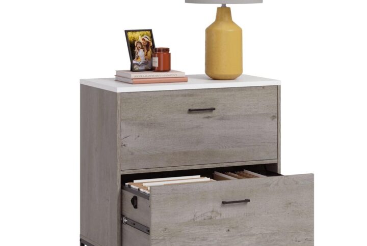 Give your home office a modern upgrade with this lateral file cabinet from the Tremont Row collection. This two drawer file cabinet features large drawers with full extension slides that can hold letter or legal-size hanging files so you can keep all your important documents organized and easy to find. The interlocking safety mechanism of this 2-drawer filing cabinet allows only one drawer to open at a time to reduce tip over accidents. This filing cabinet features a spacious top surface that provides you with additional space for items like an accent lamp