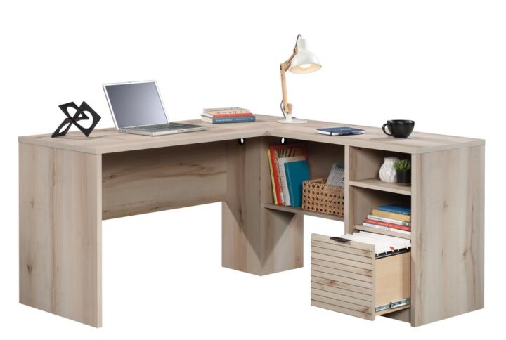 An L-shaped desk with a light finish allows you to store